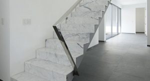 Marble staircase with glass handrail