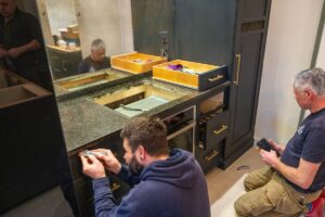 The SMG team making final adjustments to a worktop