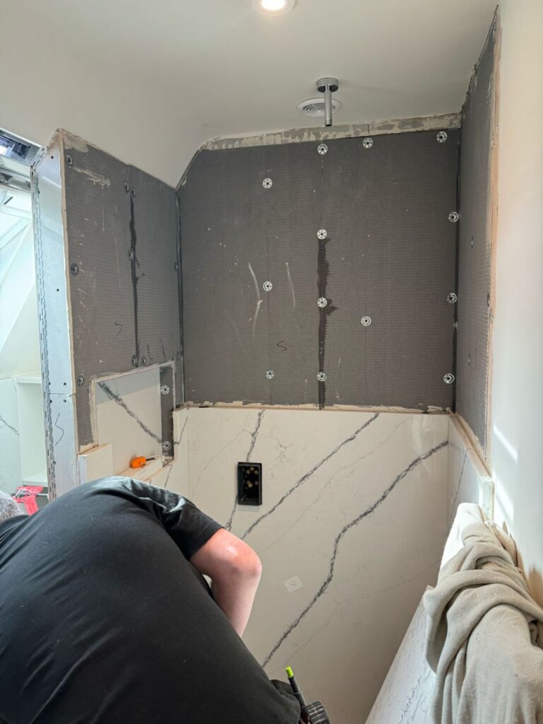 A quartz bathroom installation in progress